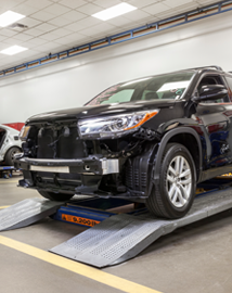 Toyota on vehicle lift | Bob Johnson Toyota in Rochester NY